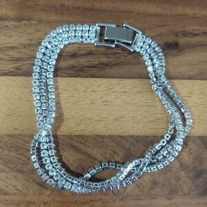 Rhinestone three strand sparkly silver tone bracelet